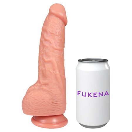 Fukena Farmer silicone dildo next to a can to show its size