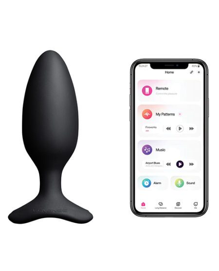 Lovense Hush 1.75" vibrating butt plug next to a phone app