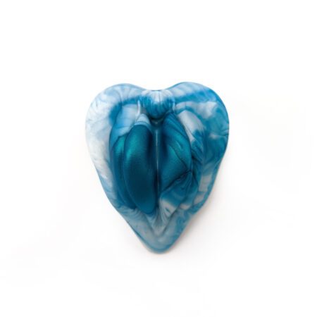 Blue green labia shaped silicone grinder from Uberrime on a white background