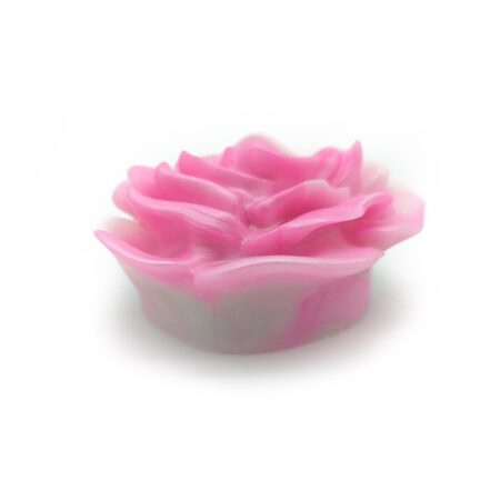 Side view of the pink rose shaped silicone grinder from Uberrime on a white background