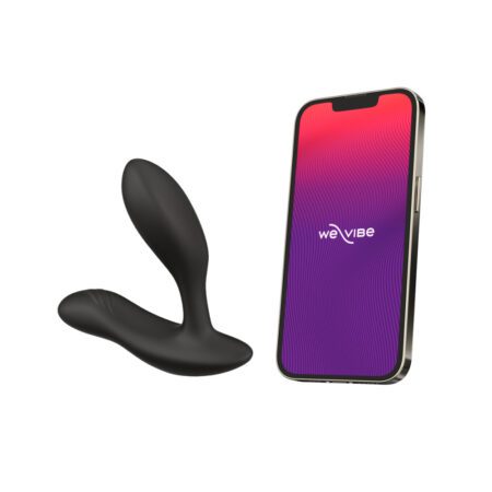 We Vibe Vector Plus prostate massager next to the app on a smart phone