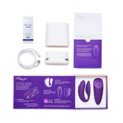 Purple We-Vibe Chorus couples vibrator with all of the box contents including charging cable, instruction manual and lube