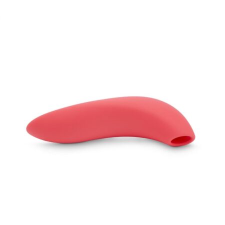 Pink We-Vibe Melt bluetooth and app controlledÂ and suction vibrator laying on its side on a white background