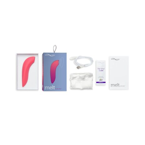 Pink We-Vibe Melt bluetooth and app controlled air pulse and suction vibrator in opened box showing contents including instruction manual, charging cable and storage bag