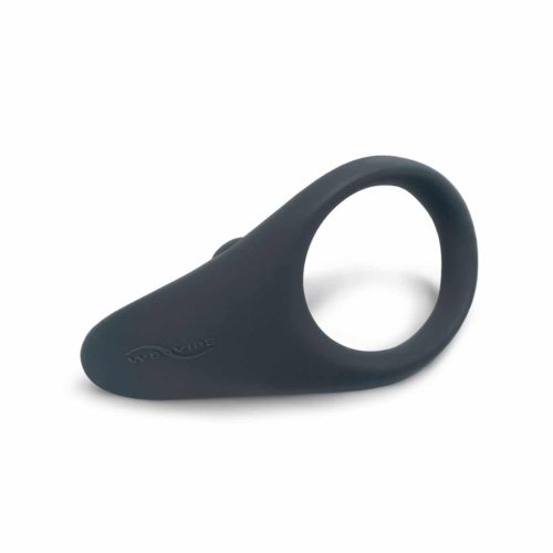 Slate colored We-Vibe Verge cock ring vibrator laying on its side on a white background