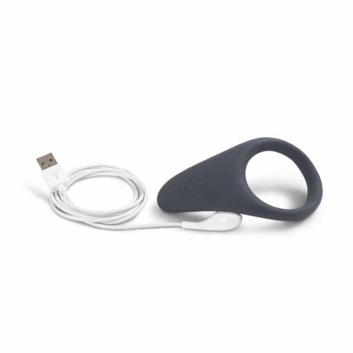 Slate colored We-Vibe Verge cock ring vibrator with USB charging cable on a white background