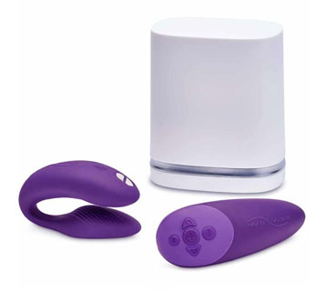 Purple We-Vibe Chorus couples vibrator with the remote control and white charging container