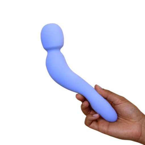 Handing holding Dame Com Wand Vibrator in Periwinkle