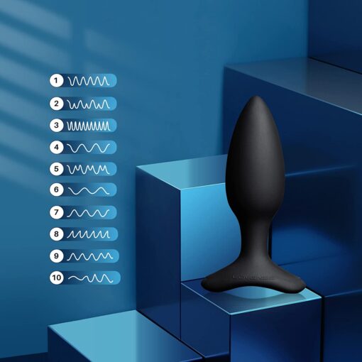 Lovense Hush 1.5" vibrating butt plug in black standing on a blue box