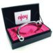 Stainless steel nJoy Pure Wand g-spot and prostate toy laying on top of the included box