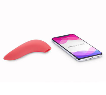 A coral colored We Vibe Melt vibrator with a smart phone showing the we connect app