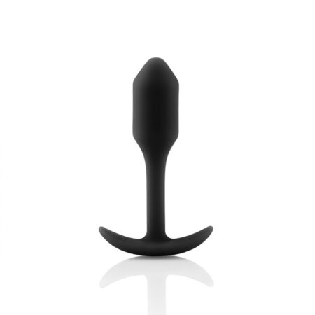 Small sized, black Snug Plug butt plug covered with  silicone standing straight up on a white background