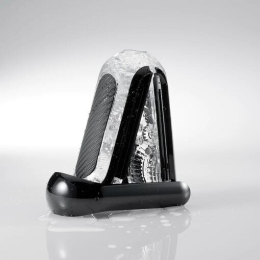 The Tenga Flip Zero Black masturbator on its drying stand