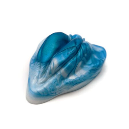 Blue green labia shaped silicone grinder from Uberrime on a white background