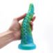 Uberrime Teuthida silcione tentical dildo being held by a hand