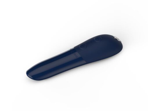 Closeup of a blue colored We-Vibe Tango X bullet vibrator charging cable facing left