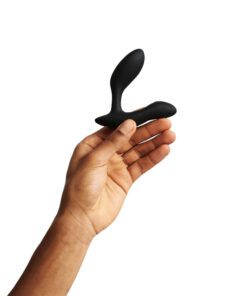 Hand holding the We Vibe Vector Plus prostate massager