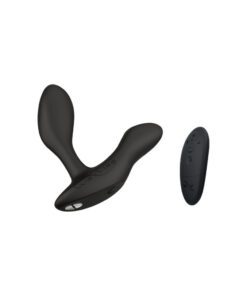 We Vibe Vector Plus prostate massager next to its remote control